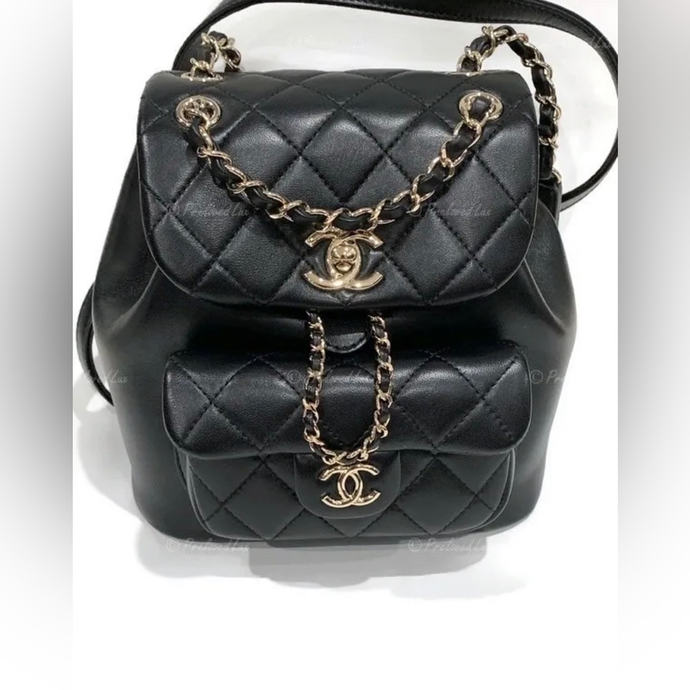 Authentic CHANEL Black lambskin Mini Duma Drawstring Backpack / Gold Hardware - Picture 2 of 12